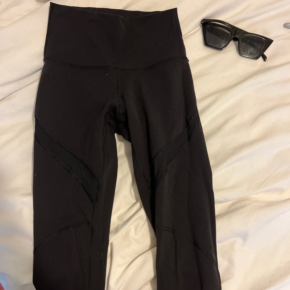 Black lululemon leggings with mesh slits